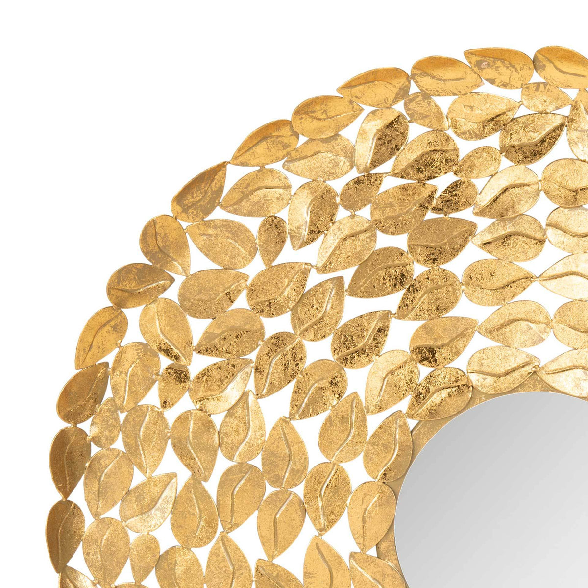 Textured gold metal leaves form an airy frame around the circular mirror