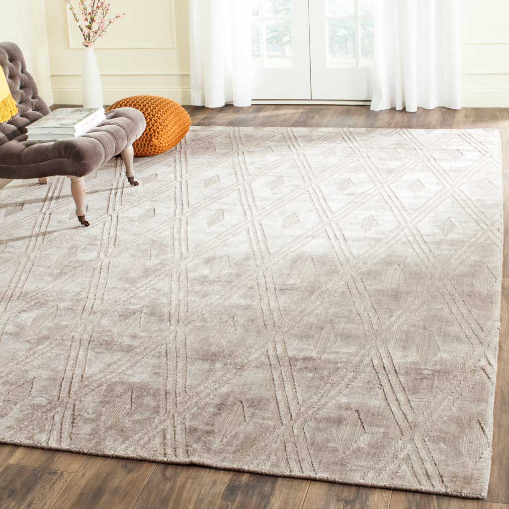Muted gray diamonds and intersecting lines create a gentle pattern beneath a chair