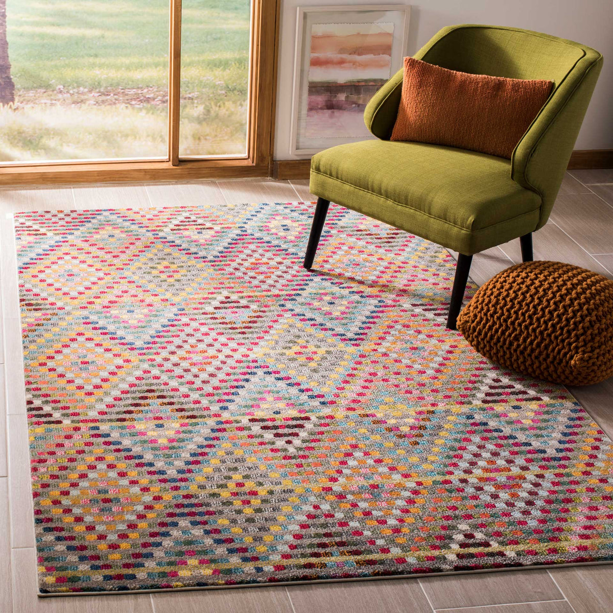 Lively multicolor dots and muted diamond motifs brighten this beige rug beneath a lounge chair.