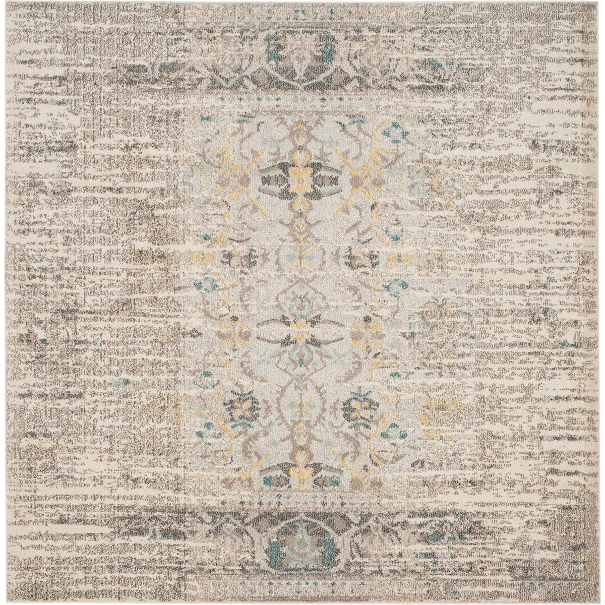 Square gray rug with intricate floral scrollwork and softly distressed dark end motifs