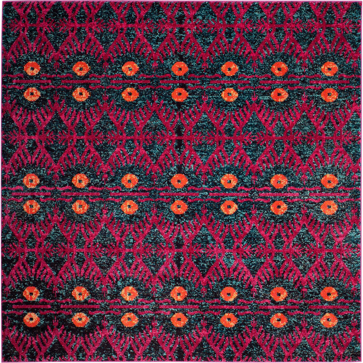 A square rug layers fuchsia scrolls and bright orange medallions on a textured dark blue field.