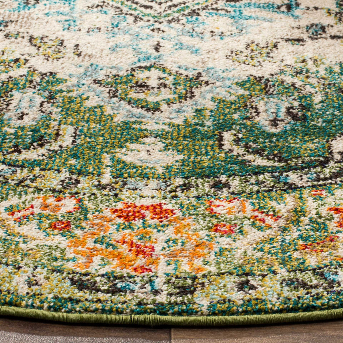 Textured green and blue flourishes sit beside orange flowers and a bound round edge