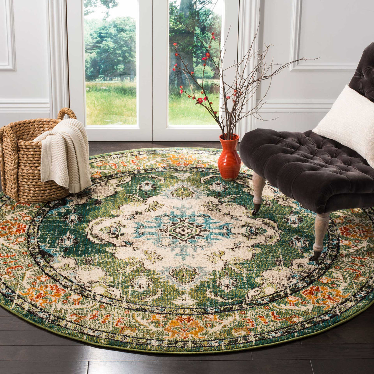 A forest green field surrounds a cream medallion with light blue flourishes and warm orange accents