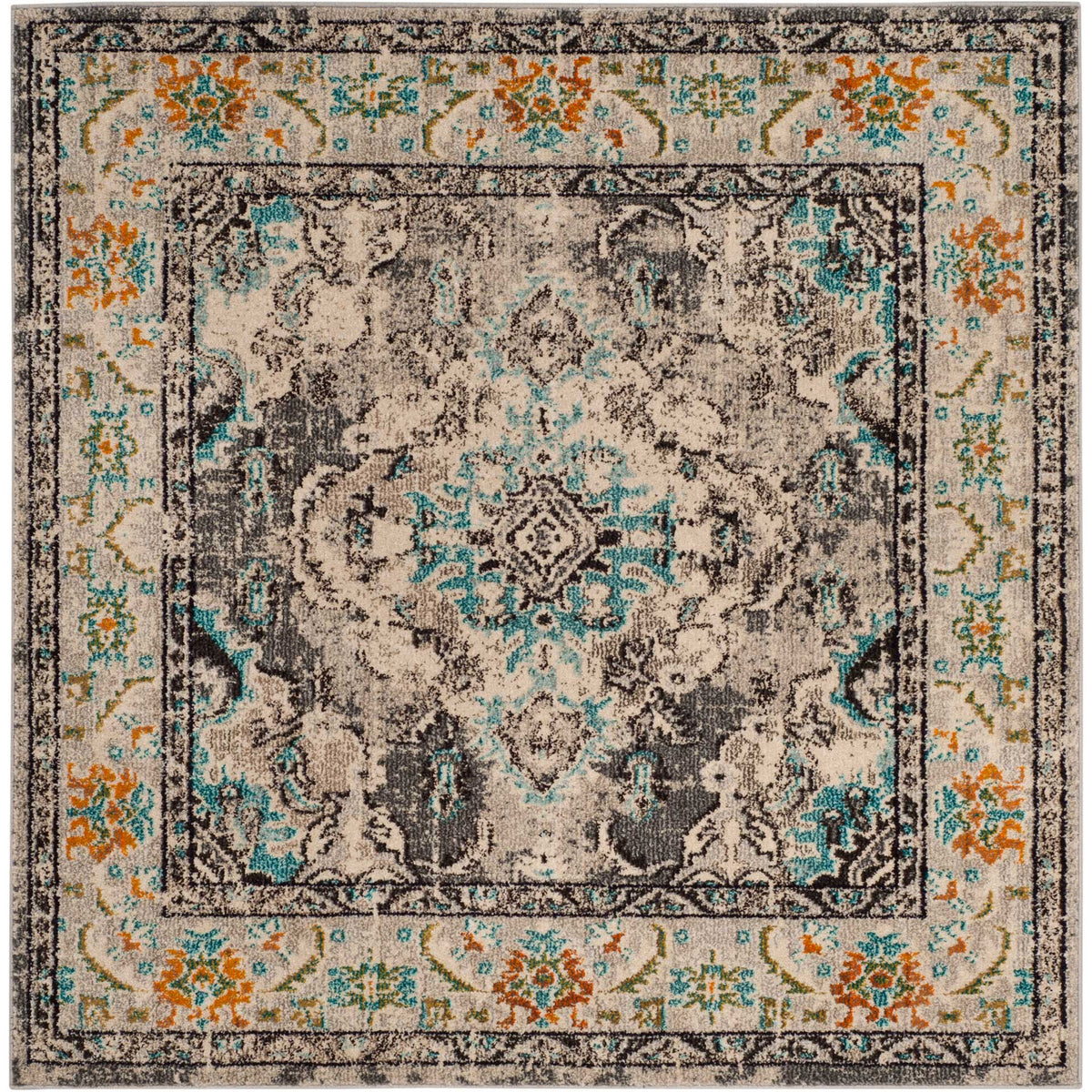 Square rug balances a distressed gray field with pale blue scrollwork and an ivory floral border