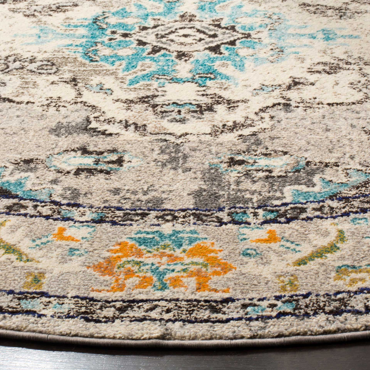 Textured gray and light blue motifs lead to a cream border with bright orange blossoms
