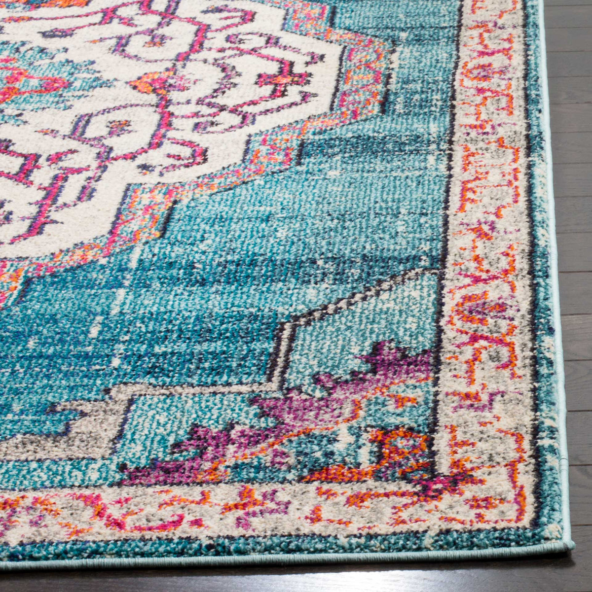 A cream floral border meets a distressed teal field and bright multicolor corner accents.