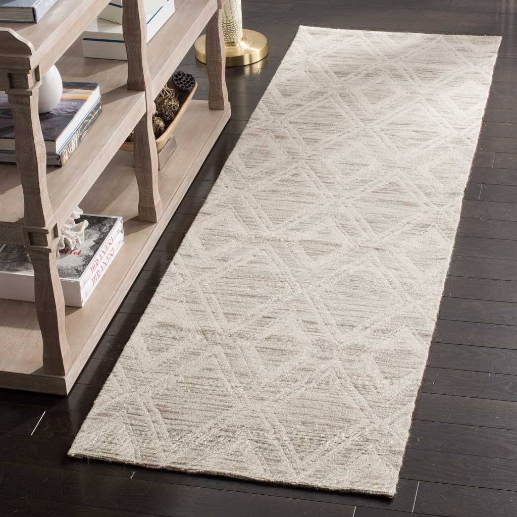 Warm neutral runner brings an intricate geometric pattern and soft texture to narrow spaces
