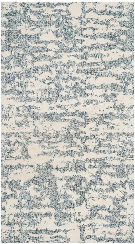 A petite blue and ivory accent rug brings softly distressed pattern to smaller spaces.