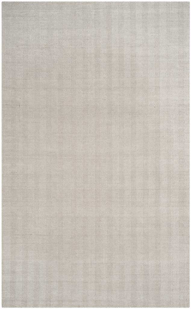 A low-profile wool and viscose rug pairs delicate geometric texture with a versatile silver hue.
