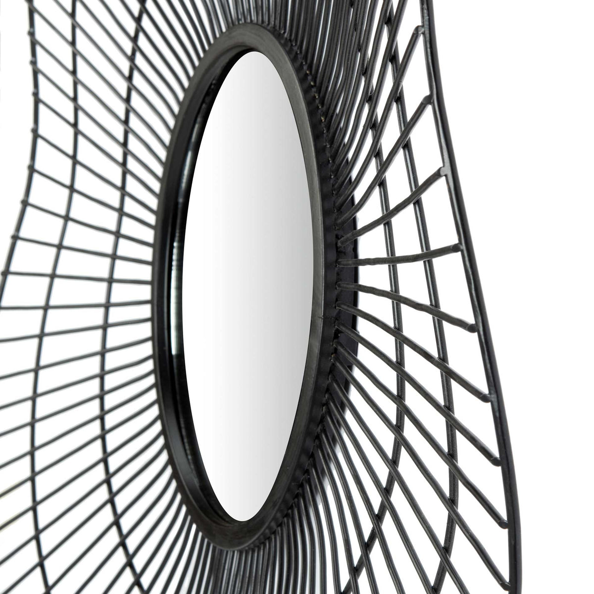 A raised mirror and sloping black metal spokes give the circular design sculptural depth.