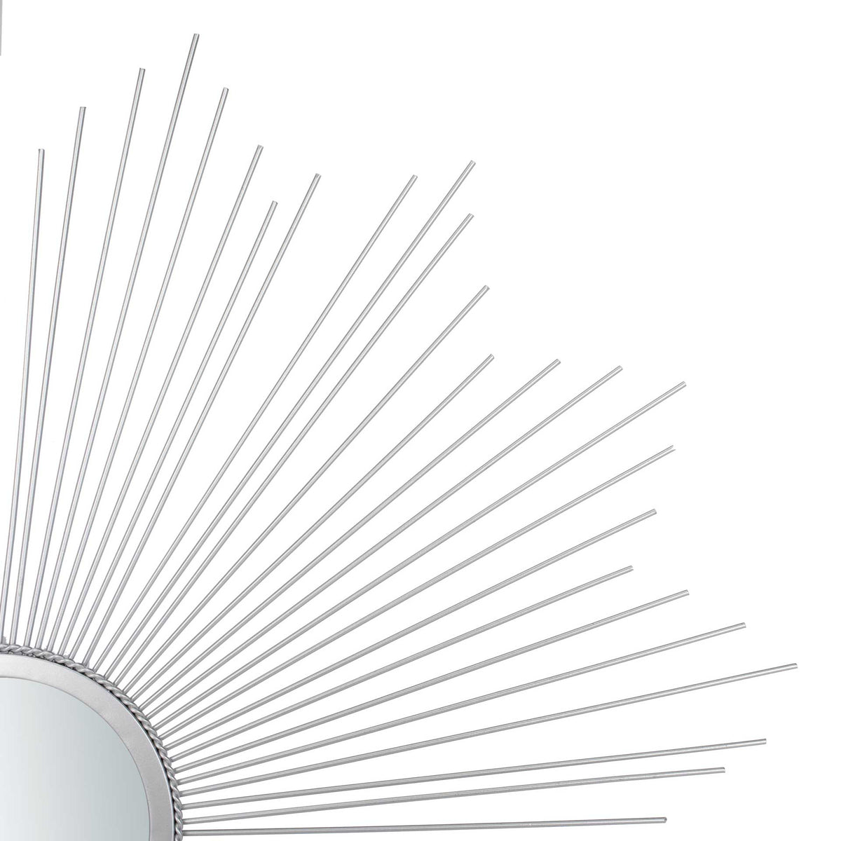 Fine silver metal rays radiate from the mirror's textured circular frame.