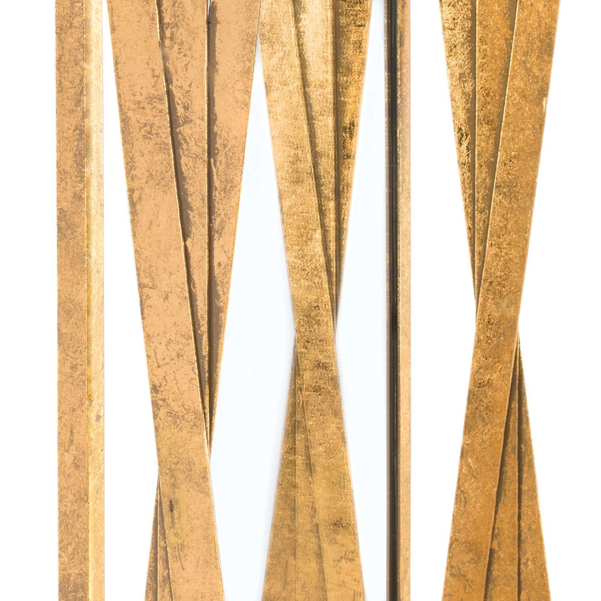 Textured gold bands taper and overlap along the mirror's sculptural frame