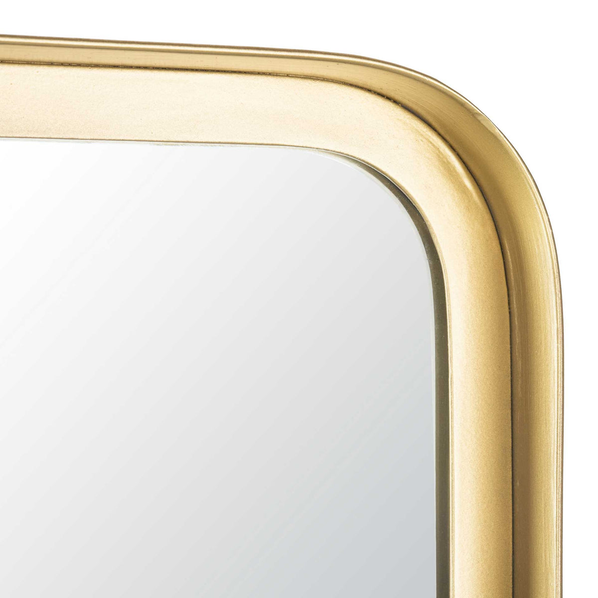 Smooth brass-tone metal curves gently around the mirror's rounded corner