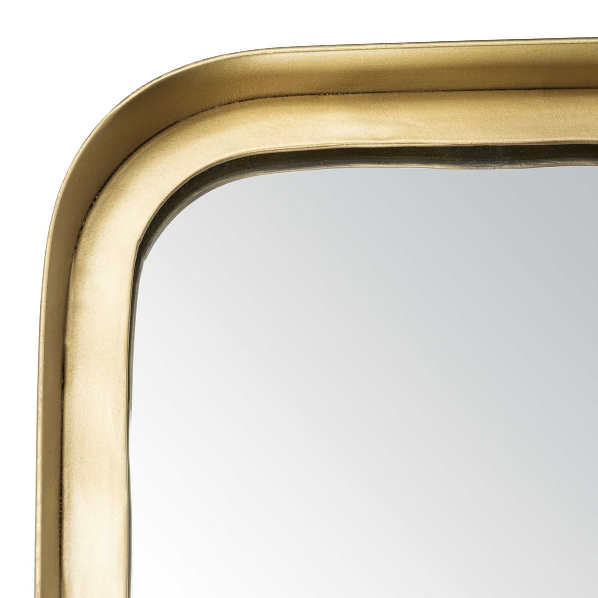 A smooth brass frame curves around the reflective glass