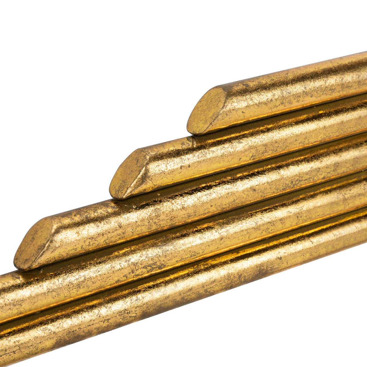 Stacked gold molding adds sculptural depth and a softly weathered metallic finish.