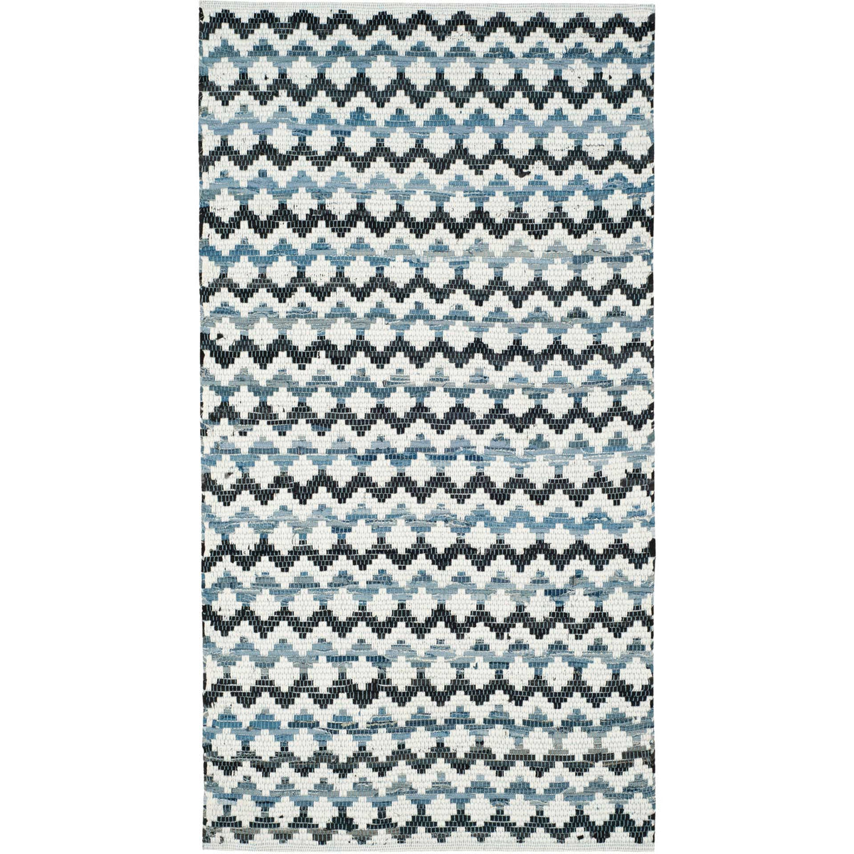 Compact ivory cotton accent rug with closely spaced black and blue zigzag rows