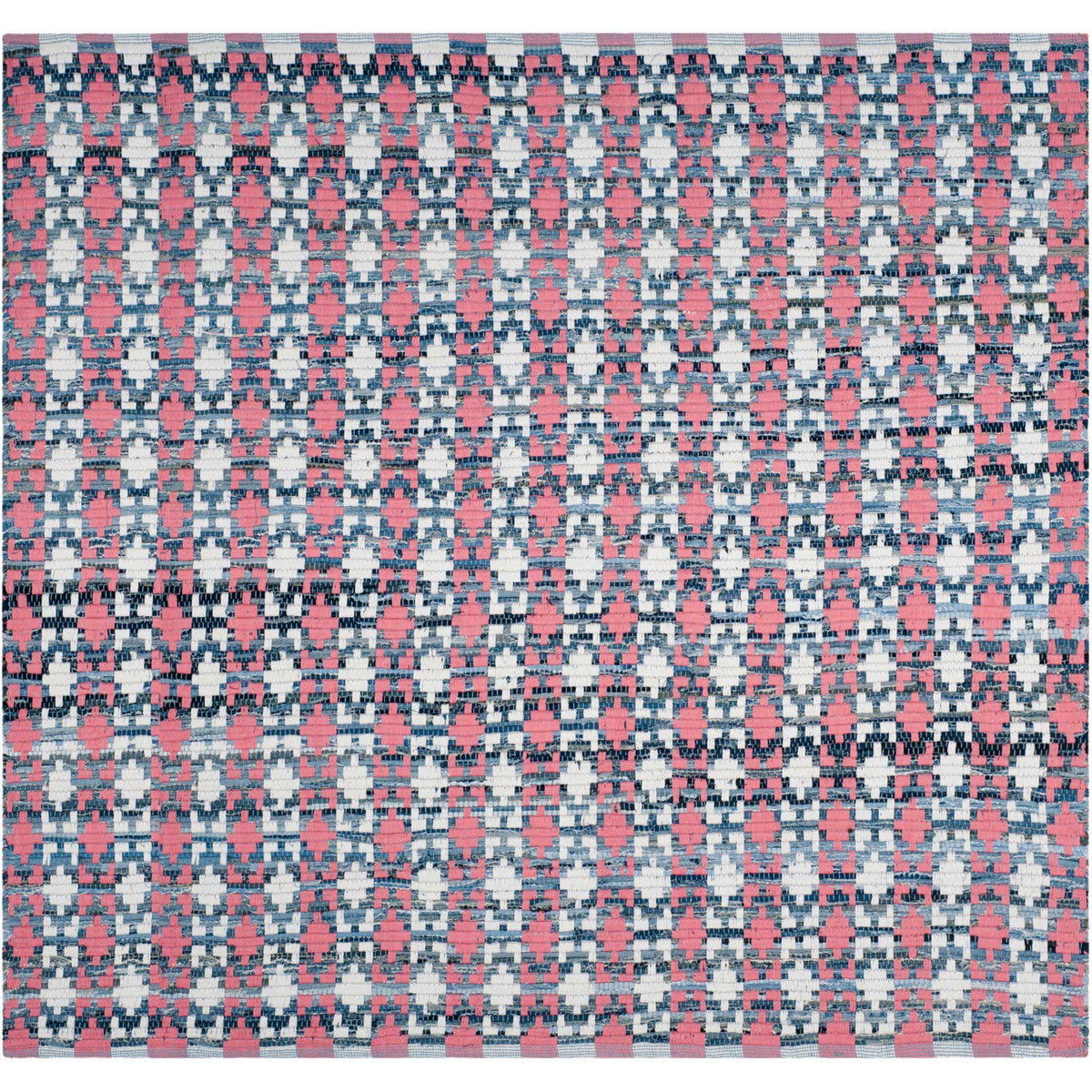 A square cotton rug mixes coral blocks with deep blue and ivory in a textured geometric weave