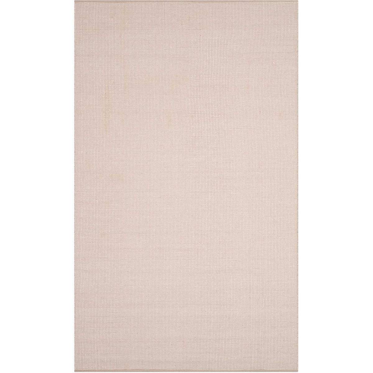 A 4' x 6' cotton rug lends subtle ivory and gray texture to a compact space.
