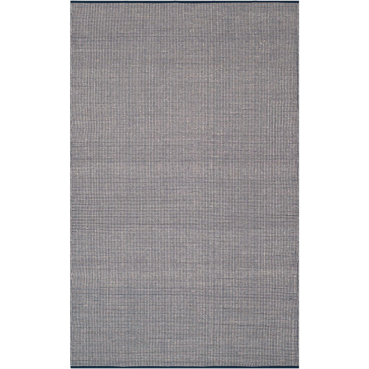 An ivory and navy 6' x 9' rug combines a finely checked weave with navy-bound ends.