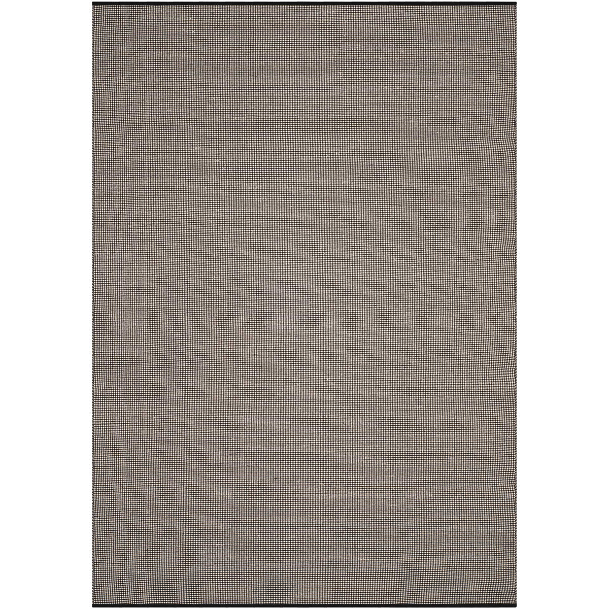 A compact 4' x 6' rug adds graphic texture with its tight ivory and black cotton weave.
