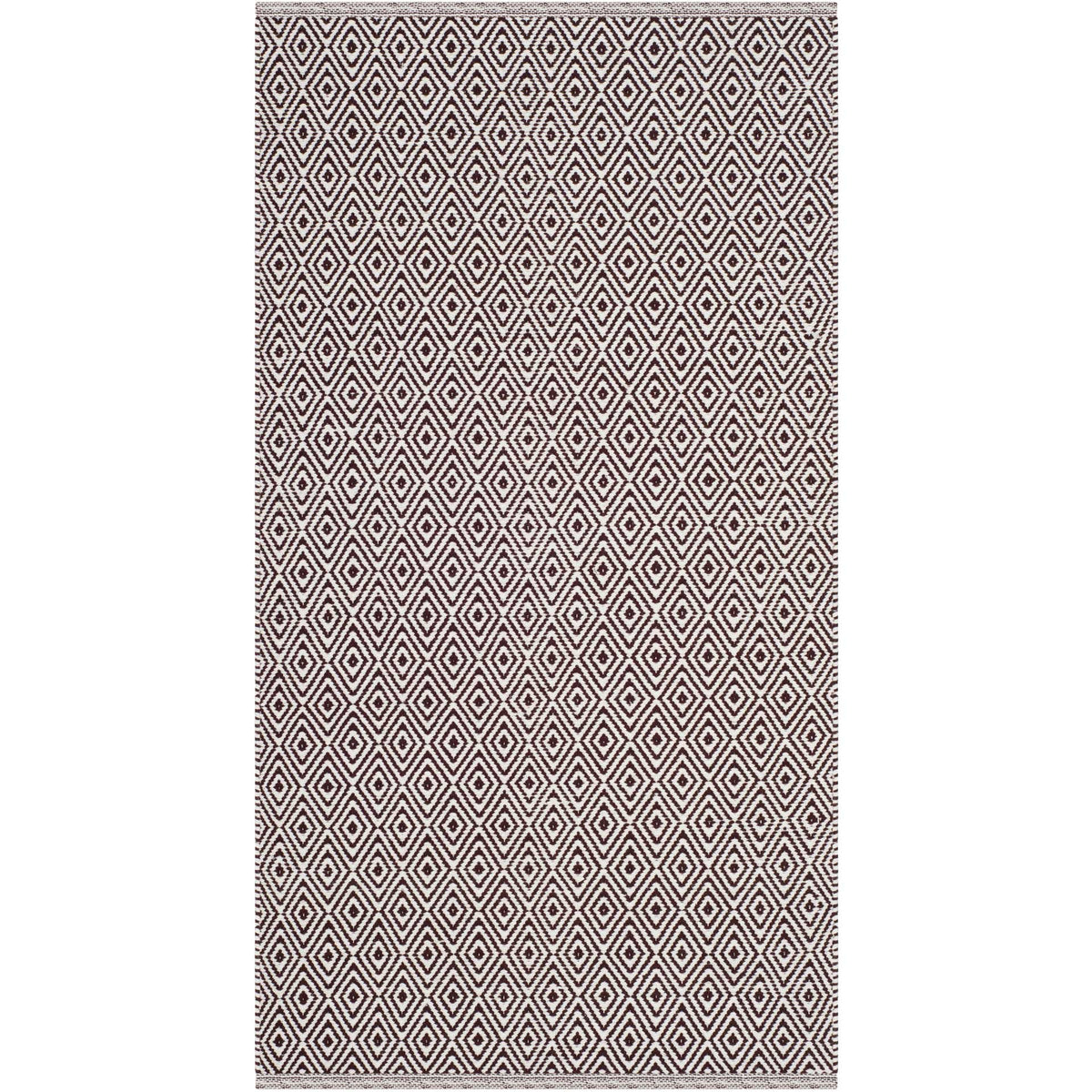 Small accent rug adds depth with rows of chocolate diamonds against ivory