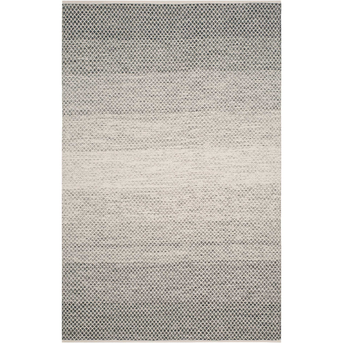 A black and ivory woven rug balances bold geometric ends with a softly blended ivory middle.