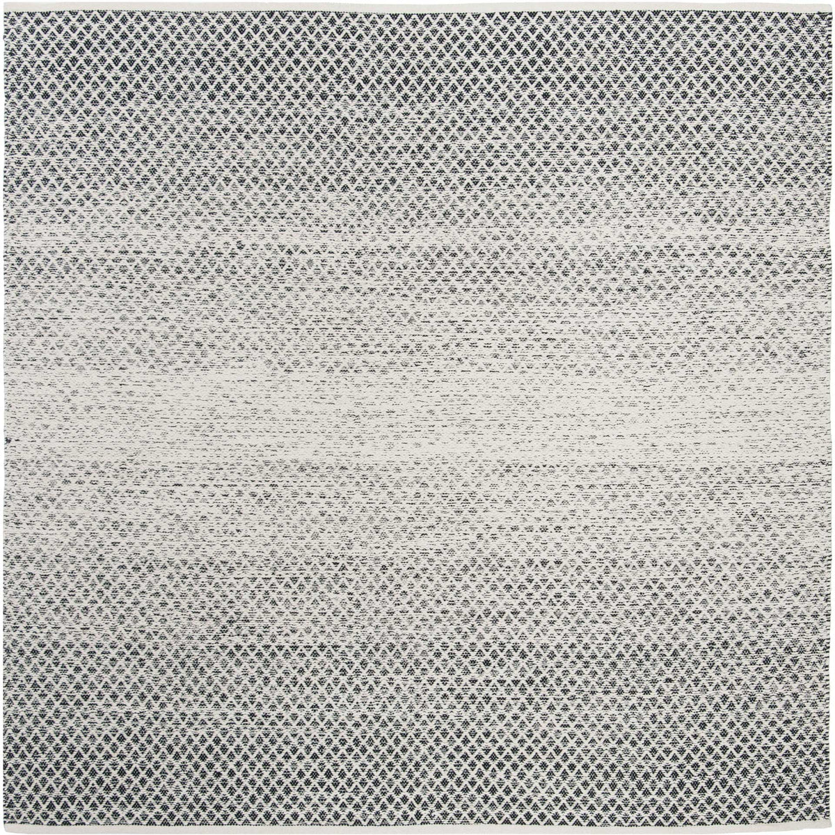 Square black and ivory rug layers fine diamond motifs around a lighter central band.