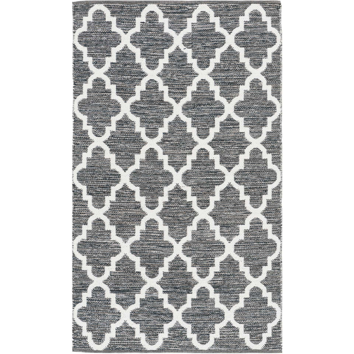 A compact charcoal and ivory rug offers striking quatrefoil pattern and a low-profile weave.