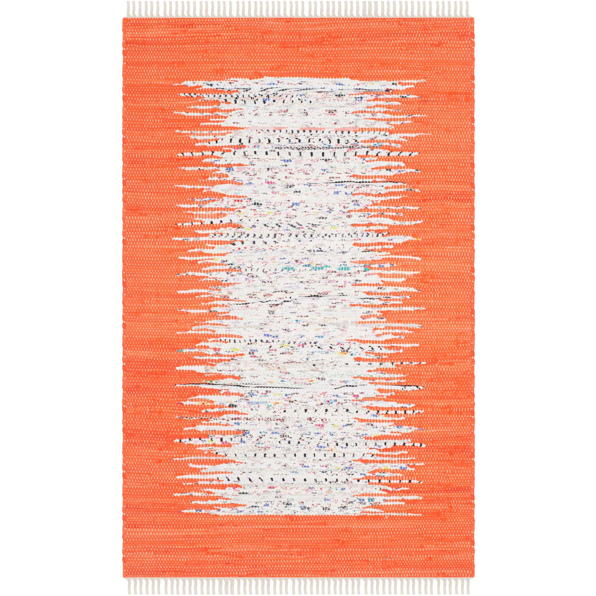 A compact orange and ivory rug adds a lively abstract center and pale fringed ends to small spaces.