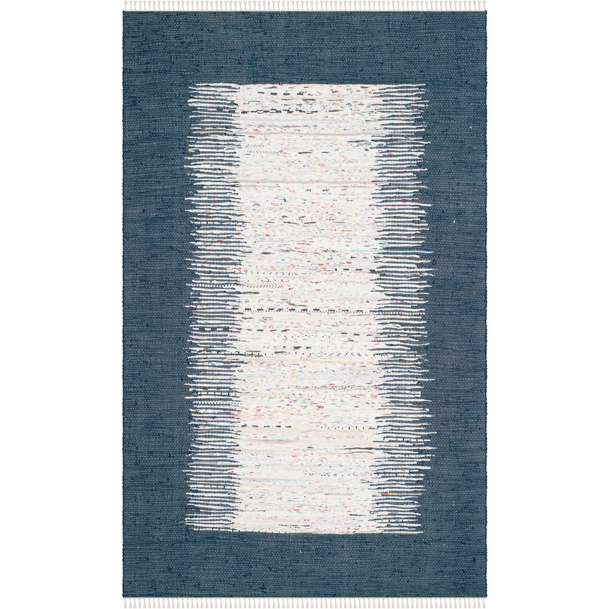 A 6' x 9' handwoven rug contrasts a lively ivory center with a textured navy frame and short fringe.