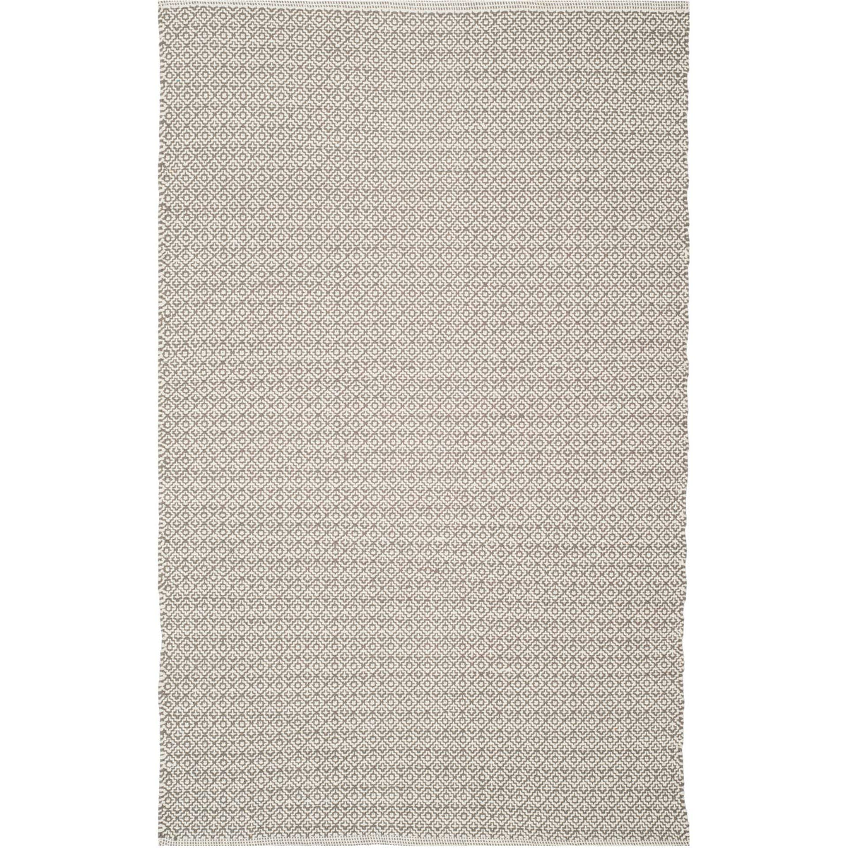 Ivory and gray hues soften the intricate geometric design of this rectangular cotton rug.
