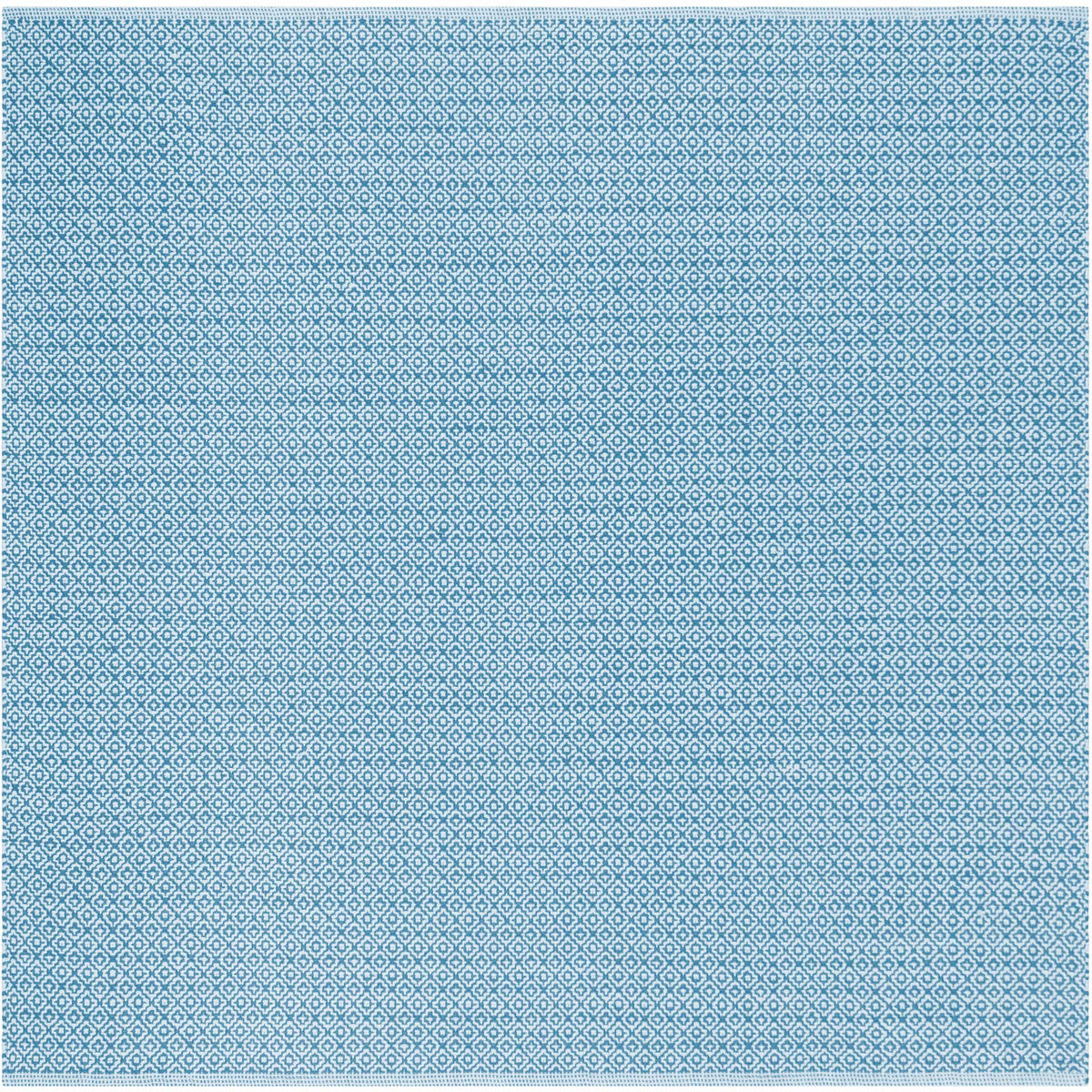 A square blue and ivory cotton rug displays a vivid, small-scale diamond pattern.