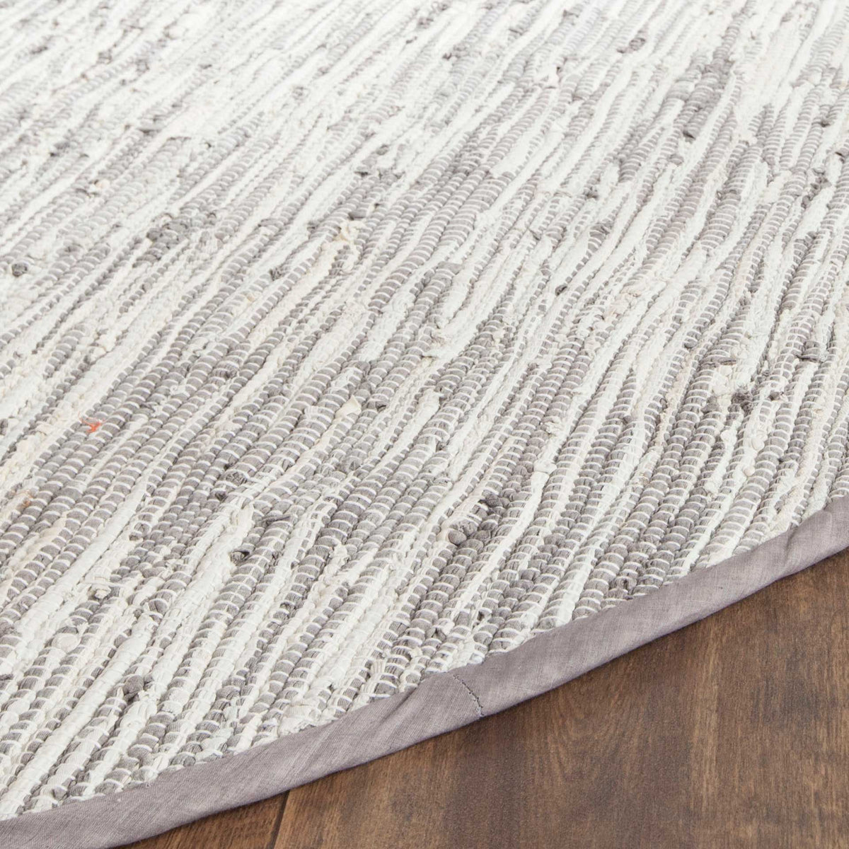 Textured silver and white cotton weave with a smooth gray bound edge