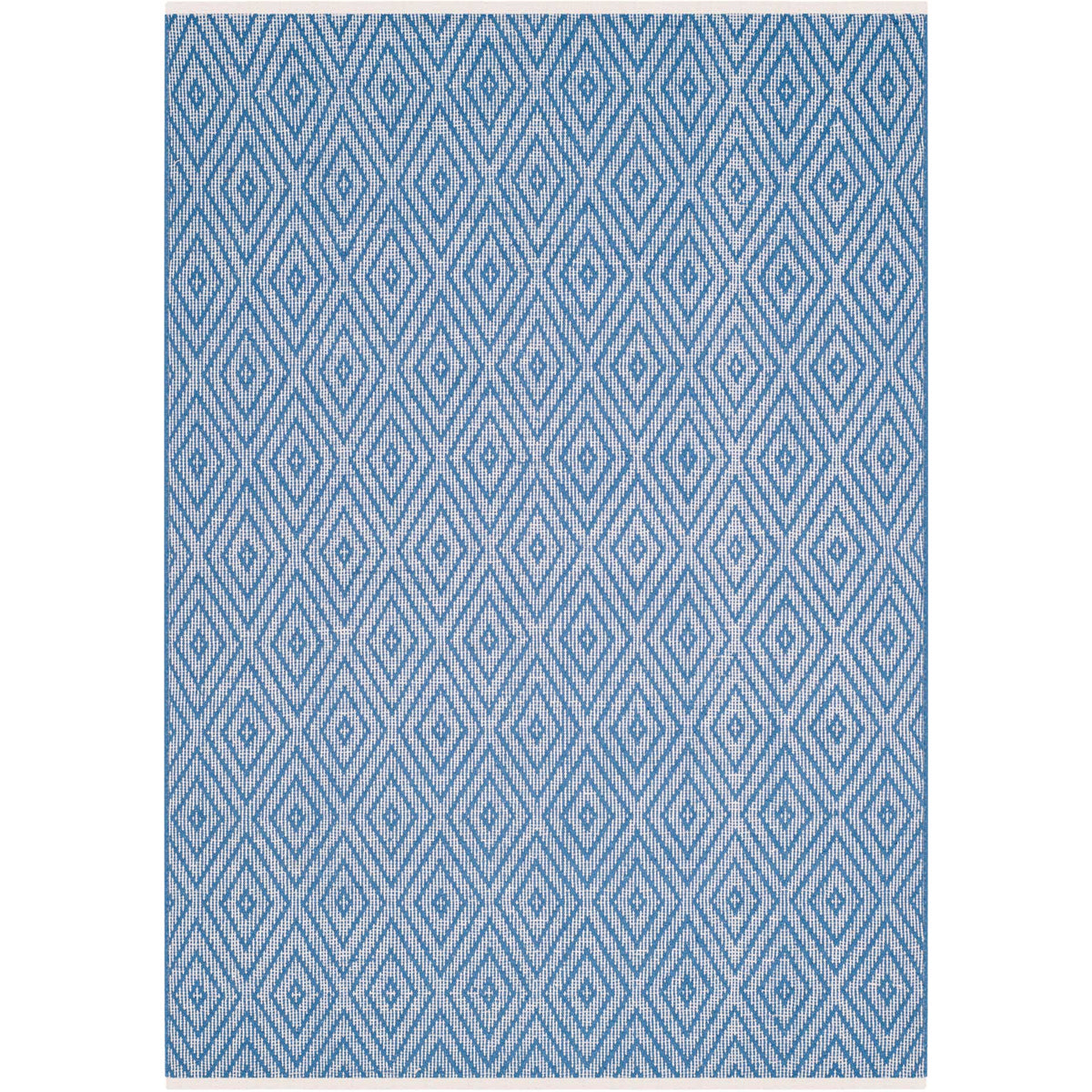 Bright blue geometric diamonds bring rhythmic pattern to a rectangular cotton rug.
