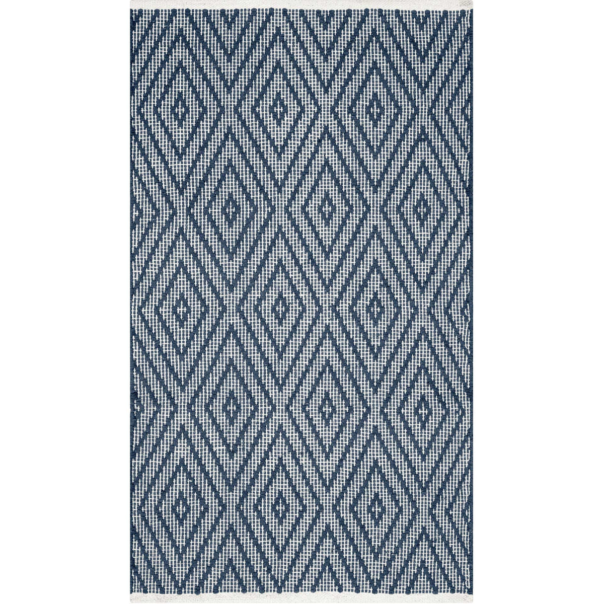 Large navy diamond shapes add graphic depth to an ivory cotton accent rug.