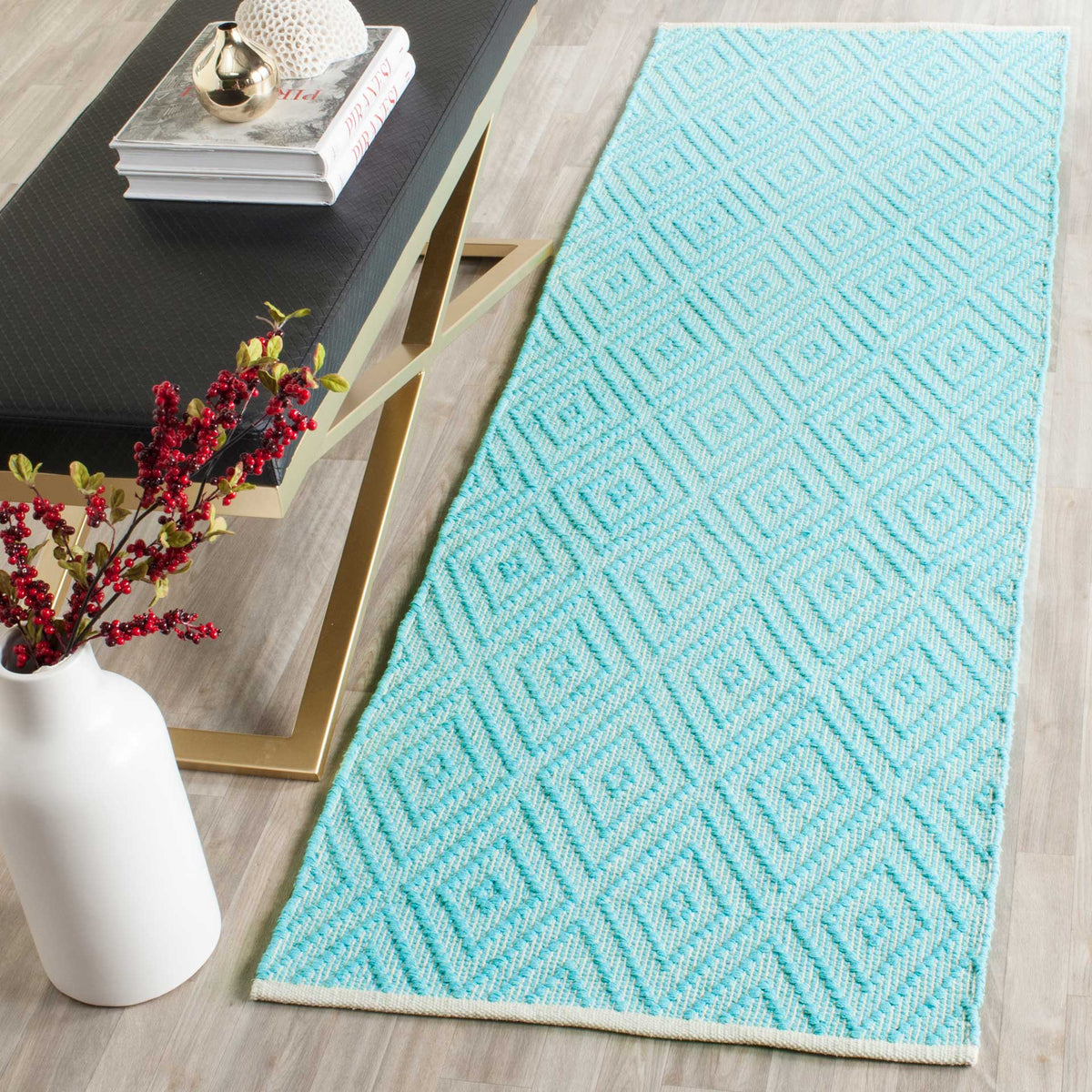 Airy turquoise diamonds bring fresh color and handcrafted texture to the floor.