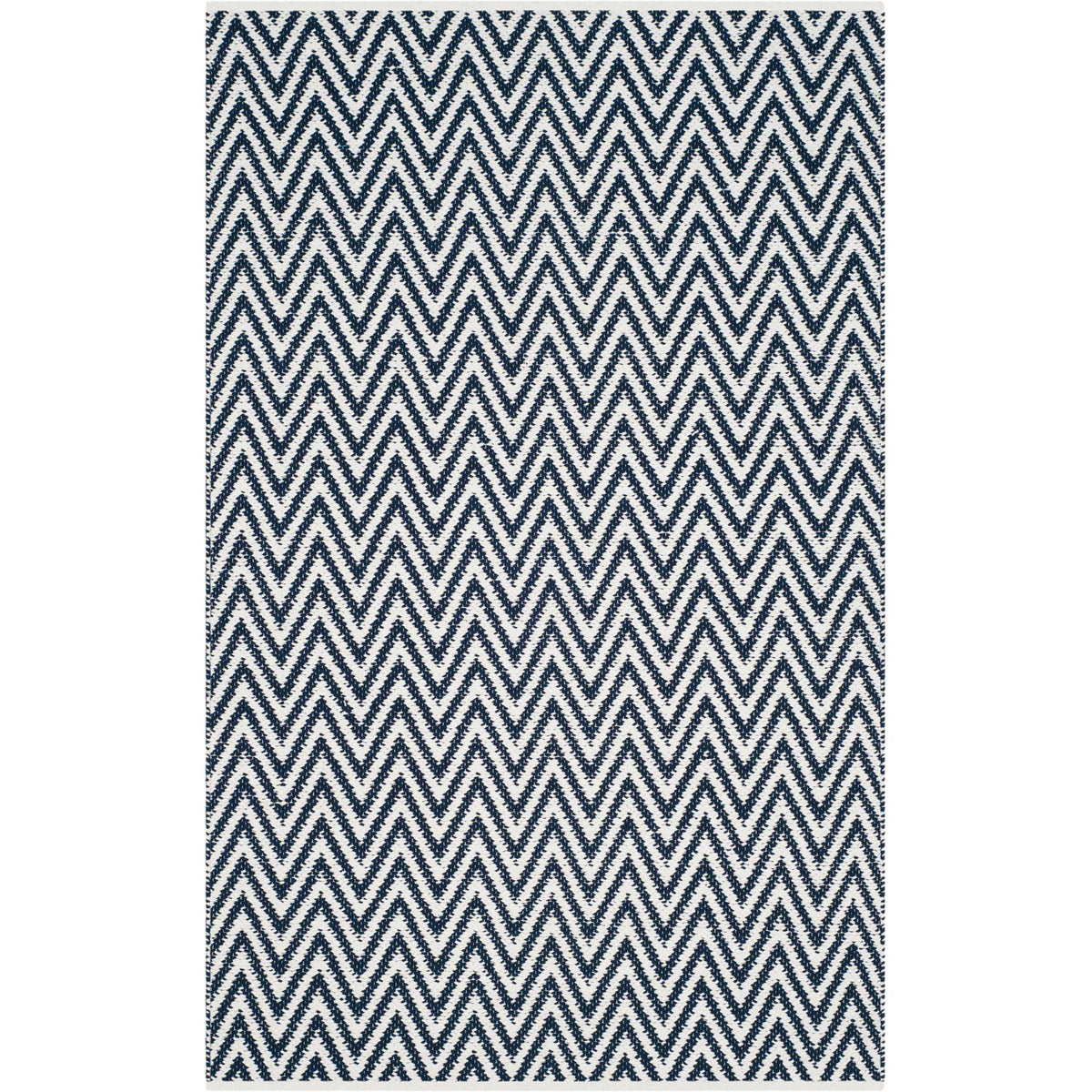 Navy zigzags on ivory add lively geometry to a smaller rectangular rug.