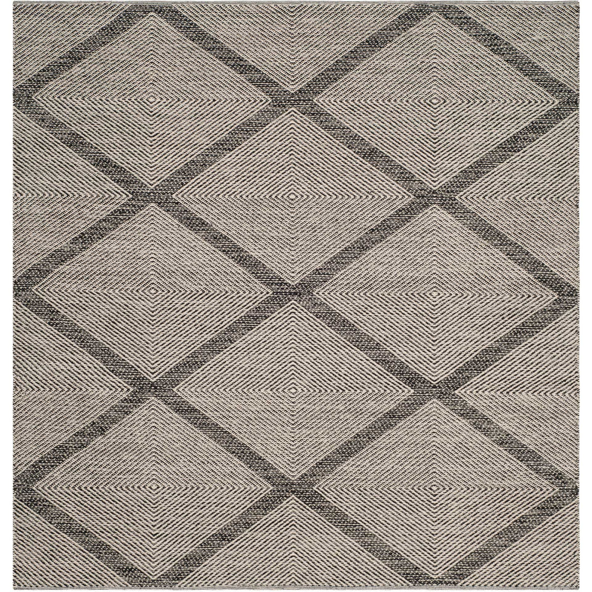 Square cotton rug layers black diamond borders over fine, light-colored woven lines.