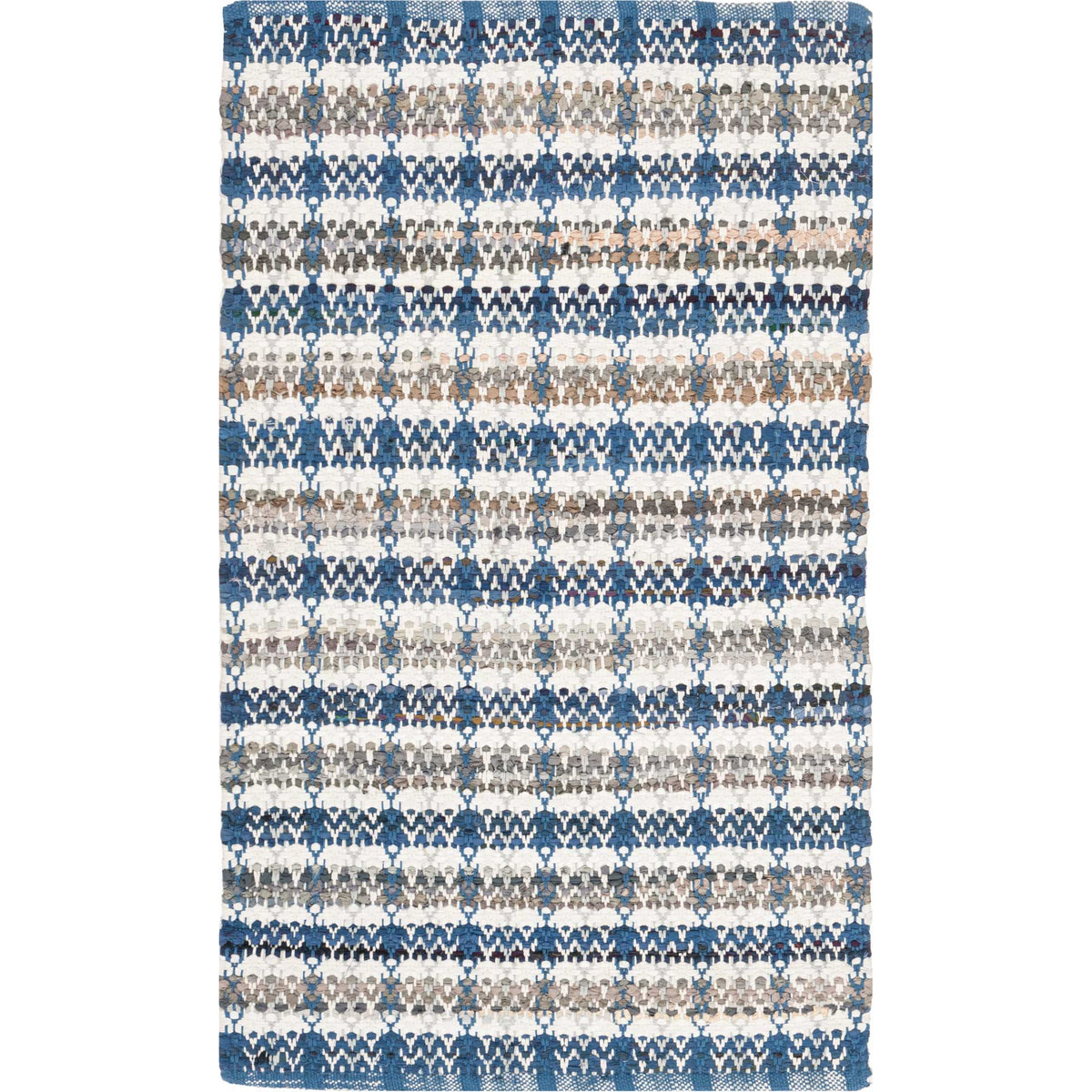 Small blue cotton rug combines intricate navy zigzags with soft ivory bands.