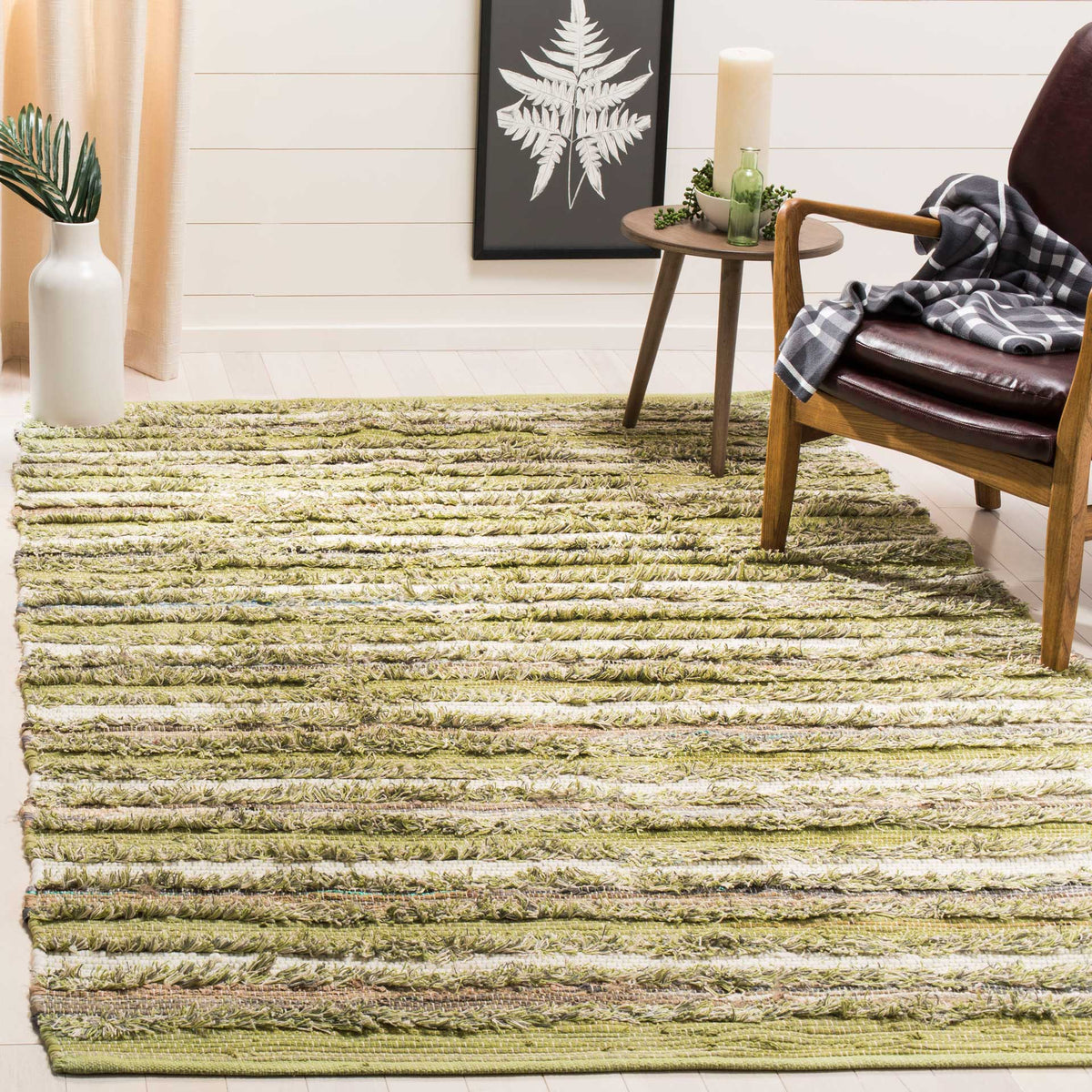 Soft olive and cream stripes bring easygoing texture and warmth to a seating area.