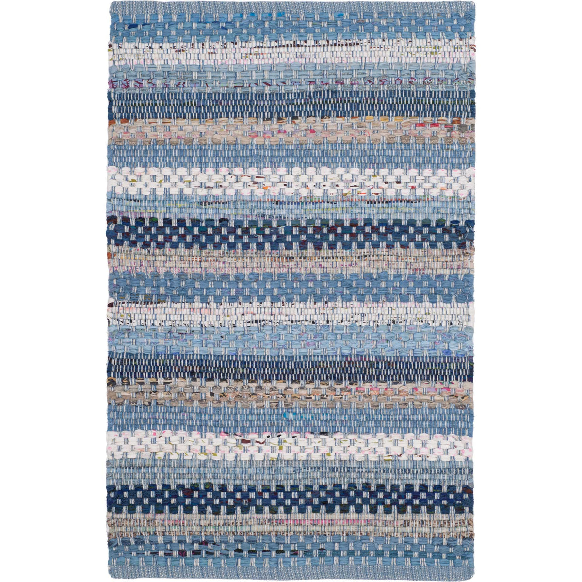 A small blue cotton rug combines thick navy bands, pale woven stripes and colorful details.