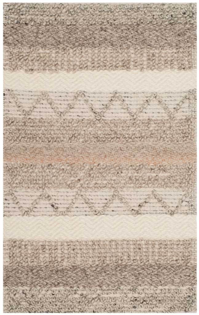 A compact beige rug pairs broad cream bands and repeating zigzags with a richly textured weave.