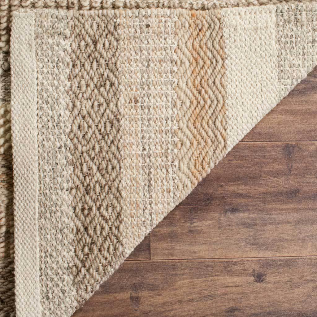 A tightly woven underside reveals natural yarn variation and neatly bound edges.