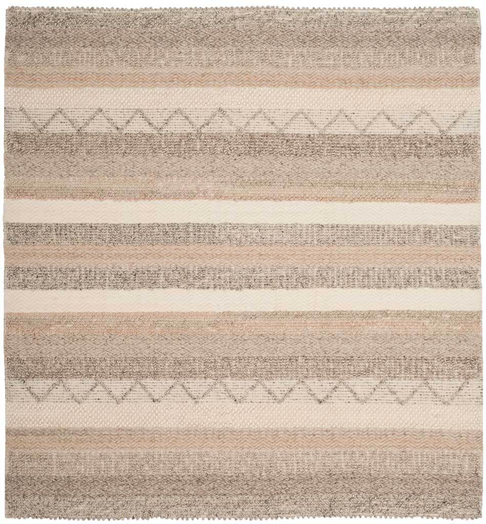 A square beige rug combines ivory bands, muted peach stripes, and delicate zigzag accents.