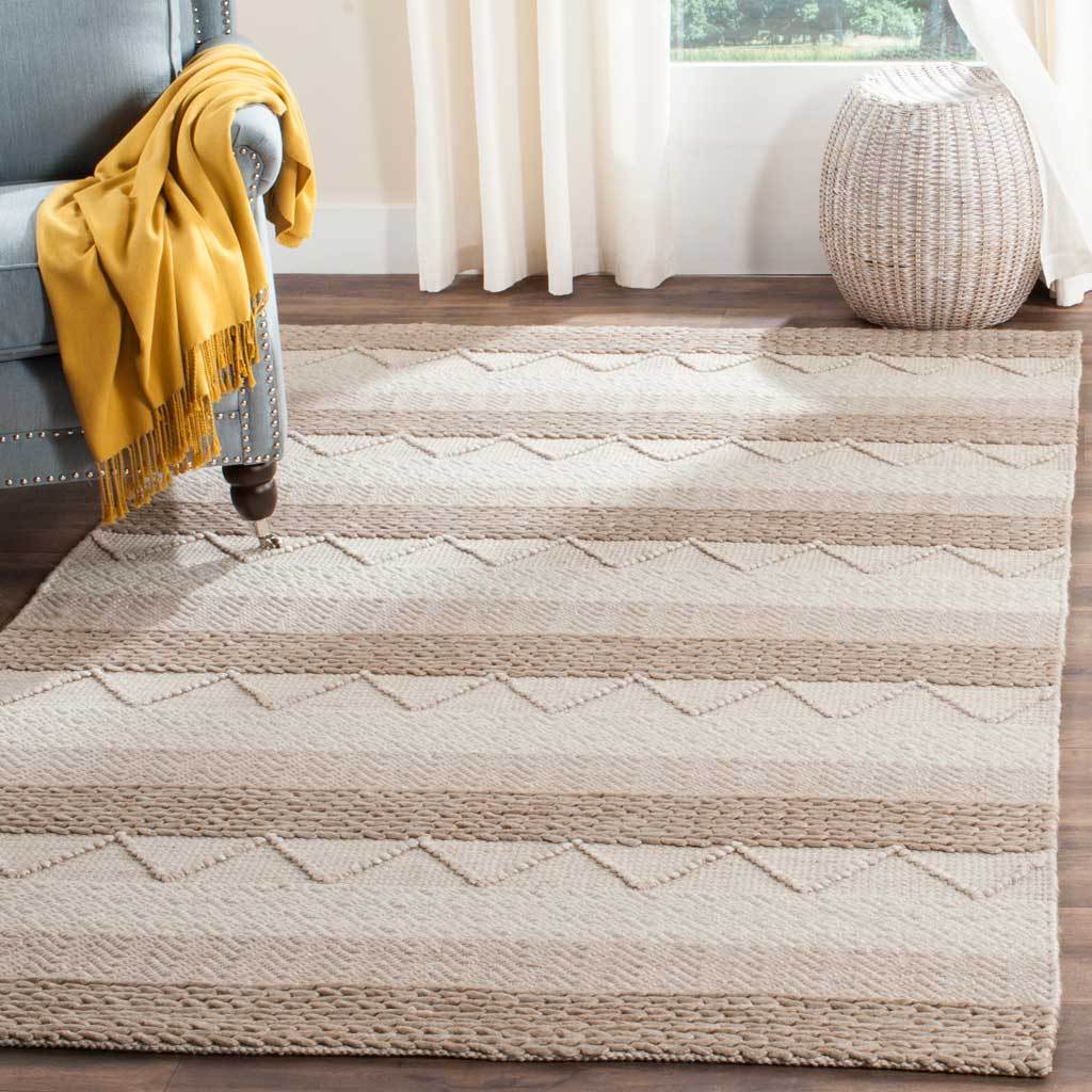 Beige and ivory stripes with raised geometric accents soften the floor beside a cozy armchair.