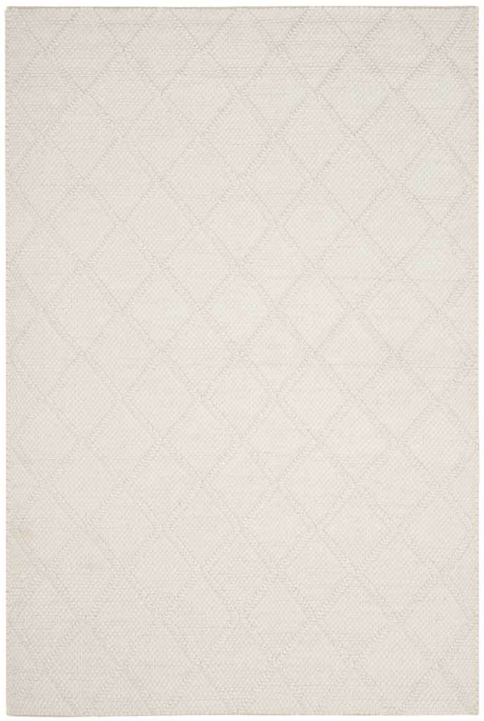 Ivory area rug with gently traced diamonds and a warm, softly woven surface.