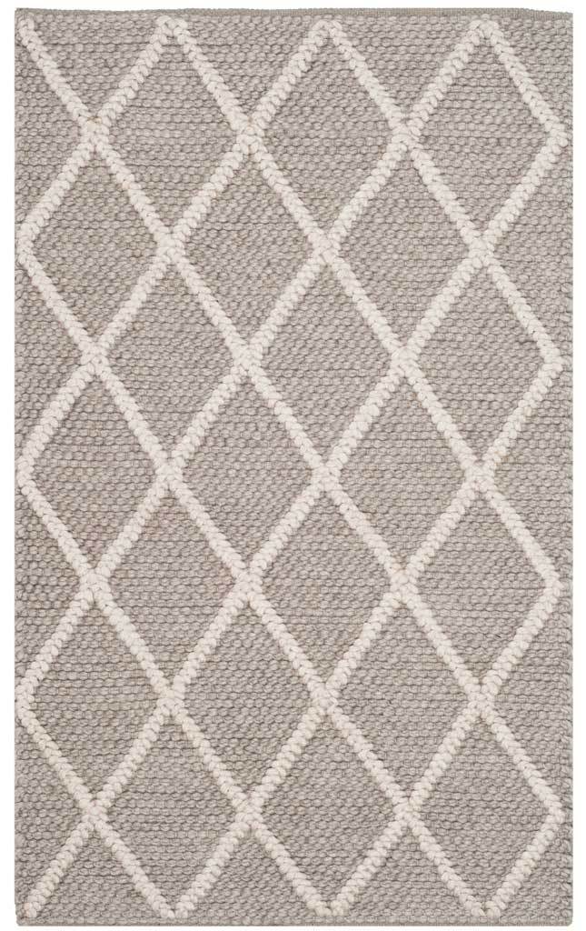A textured gray rug with raised ivory diamond lines for crisp geometric style.