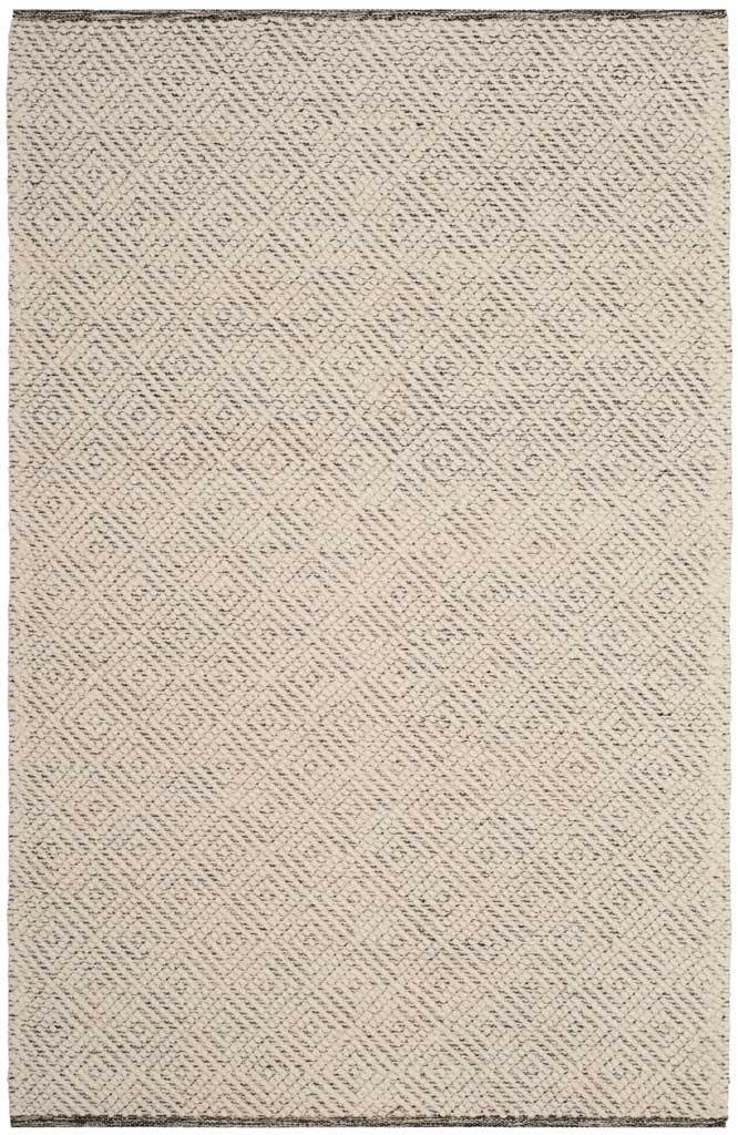 Interlocking diamonds bring quiet pattern to this ivory and light gray 4' x 6' rug.