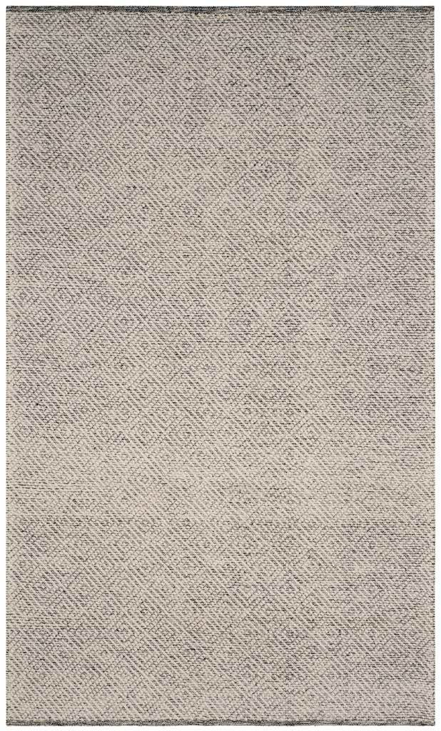 A 5' x 8' rug combines soft ivory tones with fine light gray geometric detailing.