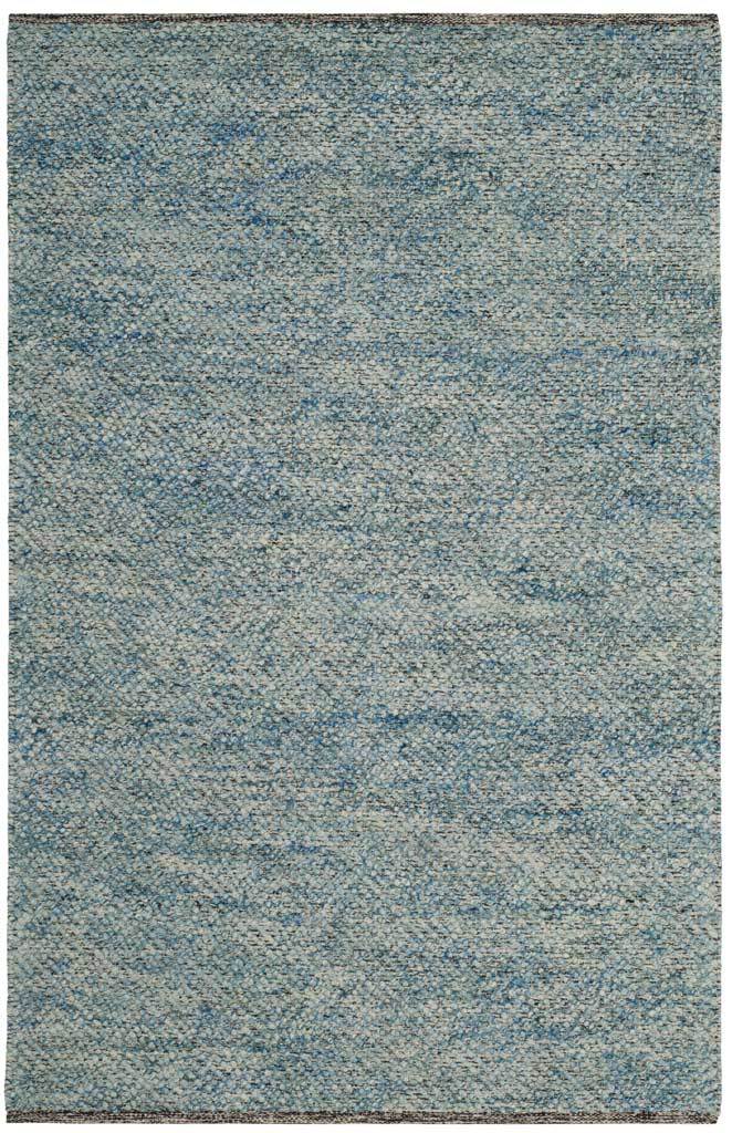 A 4' x 6' blue rug adds calm color and understated woven texture to any space.